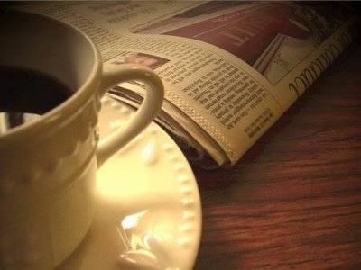 sunday paper & coffee cup